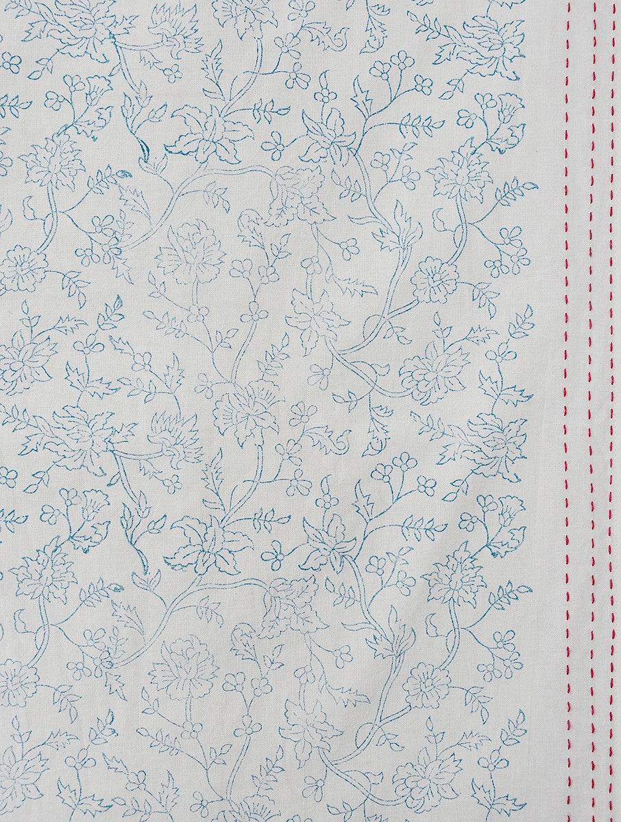 Close-up of blue jaal lattice hand block print on organic cotton bed cover | Myyra Jaipur