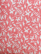 Close-up of peach hand block print on organic cotton cushion cover | Myyra Jaipur