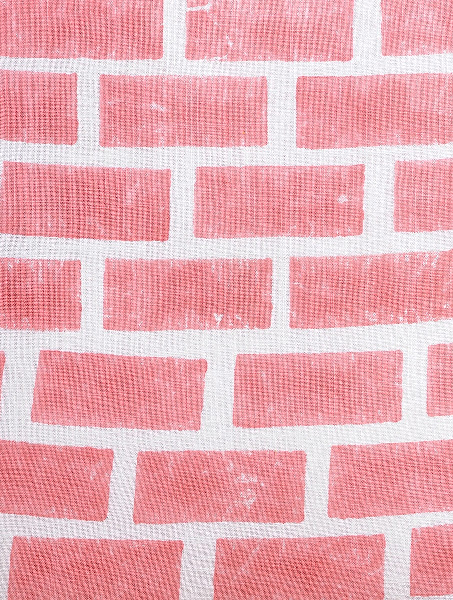 Close-up of peach bricks hand block print on organic cotton cushion cover | Myyra Jaipur