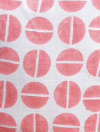 Close-up of peach hand block print on organic cotton cushion cover | Myyra Jaipur